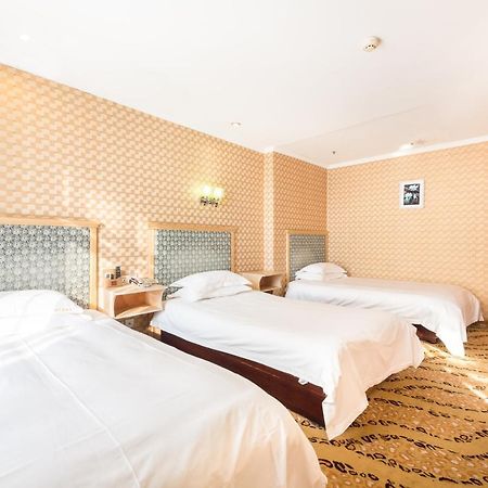Omeiga Business Hotel Yiwu (Zhejiang) Exterior foto