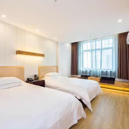 Omeiga Business Hotel Yiwu (Zhejiang) Exterior foto