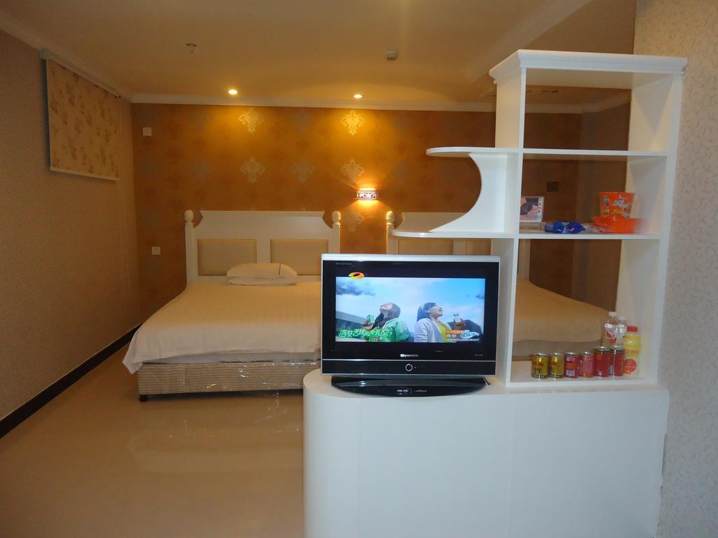 Omeiga Business Hotel Yiwu (Zhejiang) Quarto foto