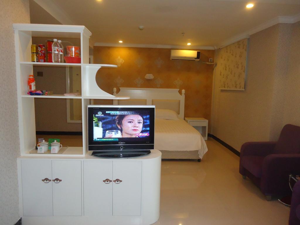 Omeiga Business Hotel Yiwu (Zhejiang) Quarto foto