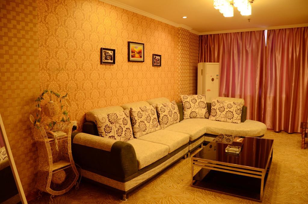 Omeiga Business Hotel Yiwu (Zhejiang) Quarto foto