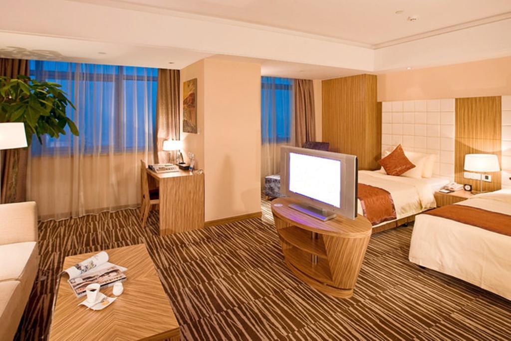 Omeiga Business Hotel Yiwu (Zhejiang) Quarto foto