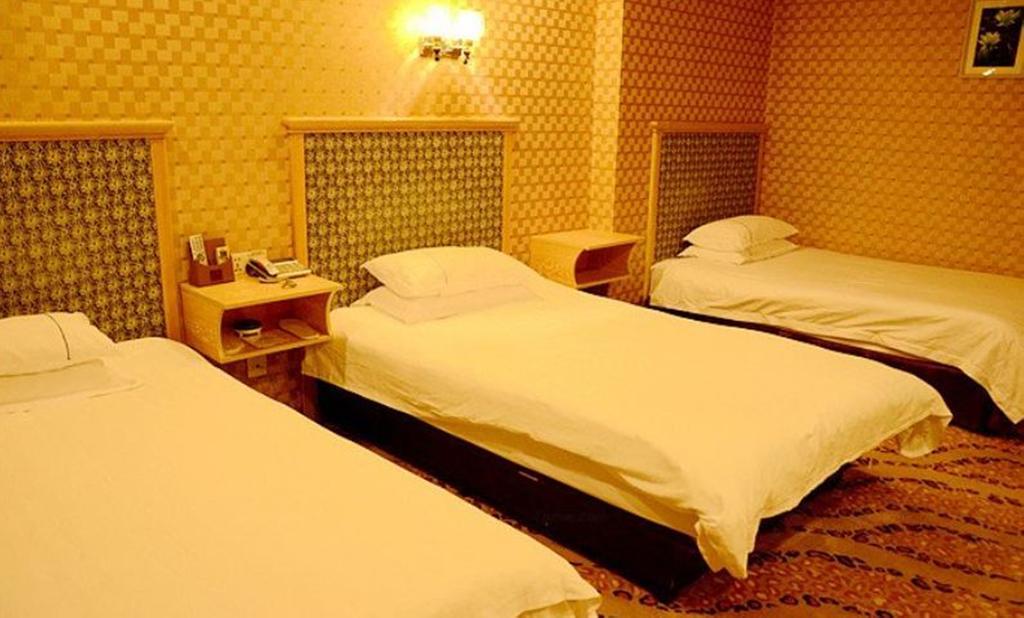 Omeiga Business Hotel Yiwu (Zhejiang) Quarto foto