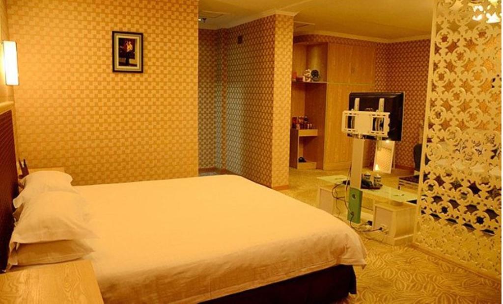 Omeiga Business Hotel Yiwu (Zhejiang) Quarto foto