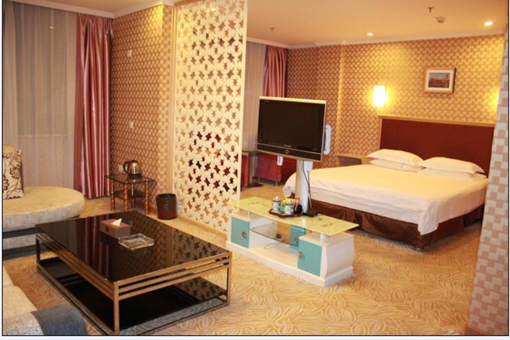 Omeiga Business Hotel Yiwu (Zhejiang) Quarto foto