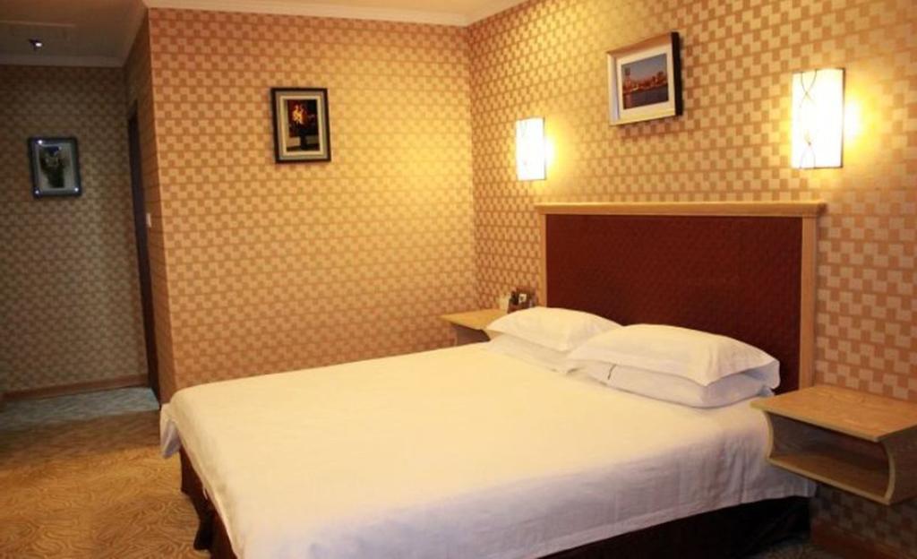 Omeiga Business Hotel Yiwu (Zhejiang) Quarto foto