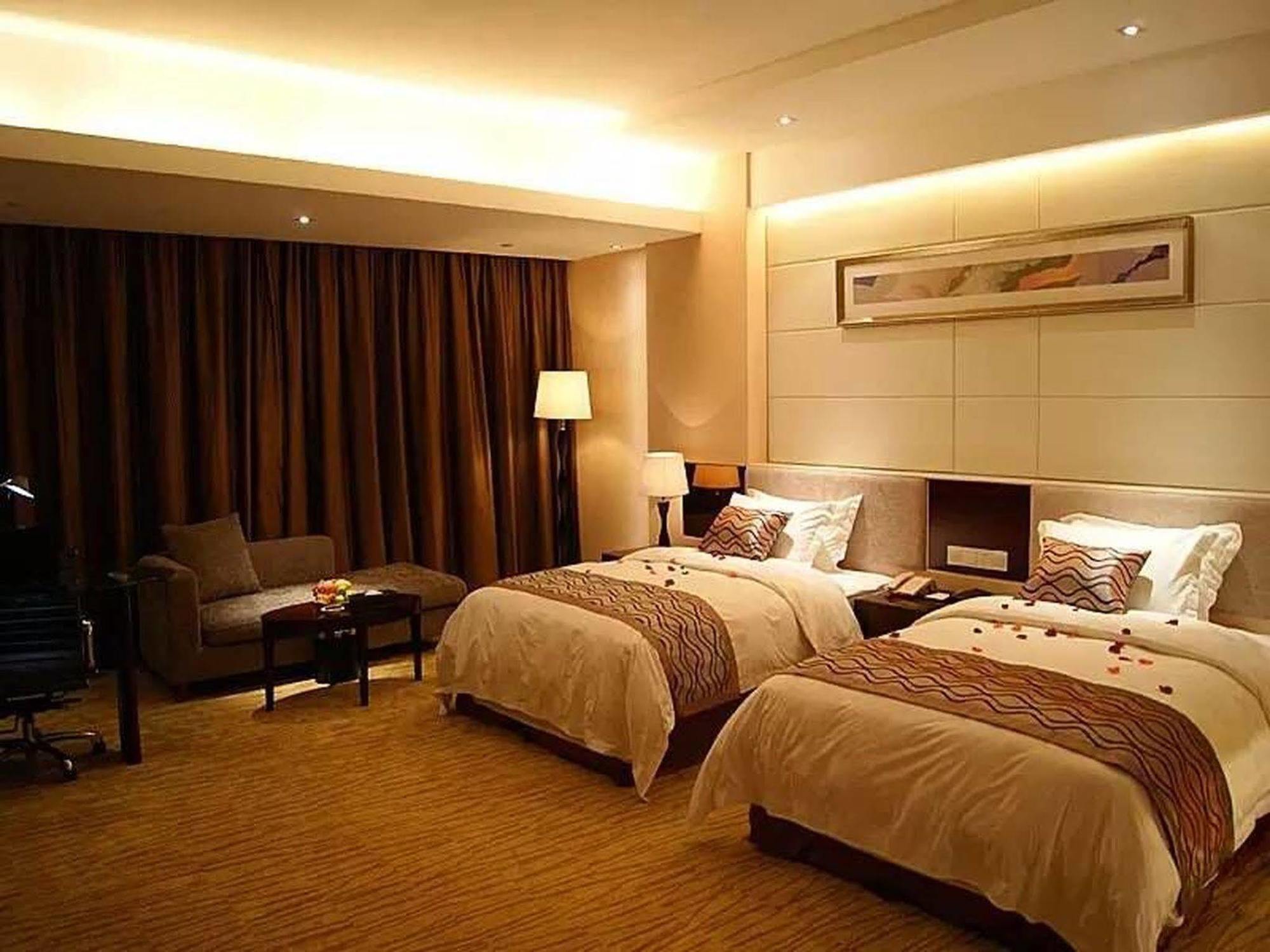Omeiga Business Hotel Yiwu (Zhejiang) Exterior foto