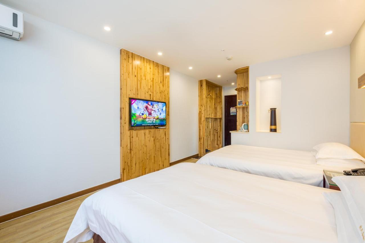 Omeiga Business Hotel Yiwu (Zhejiang) Exterior foto