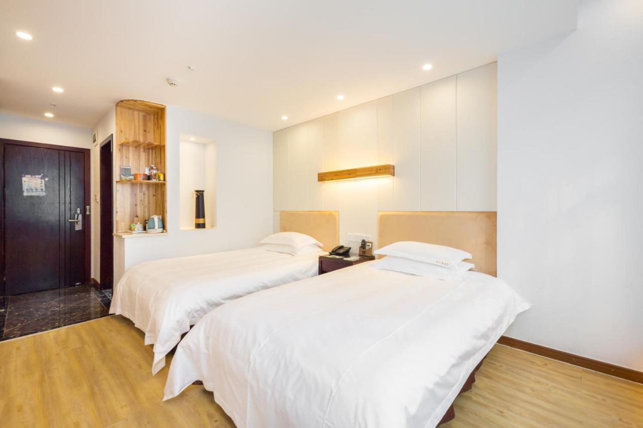 Omeiga Business Hotel Yiwu (Zhejiang) Exterior foto